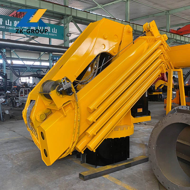 Folding boom crane